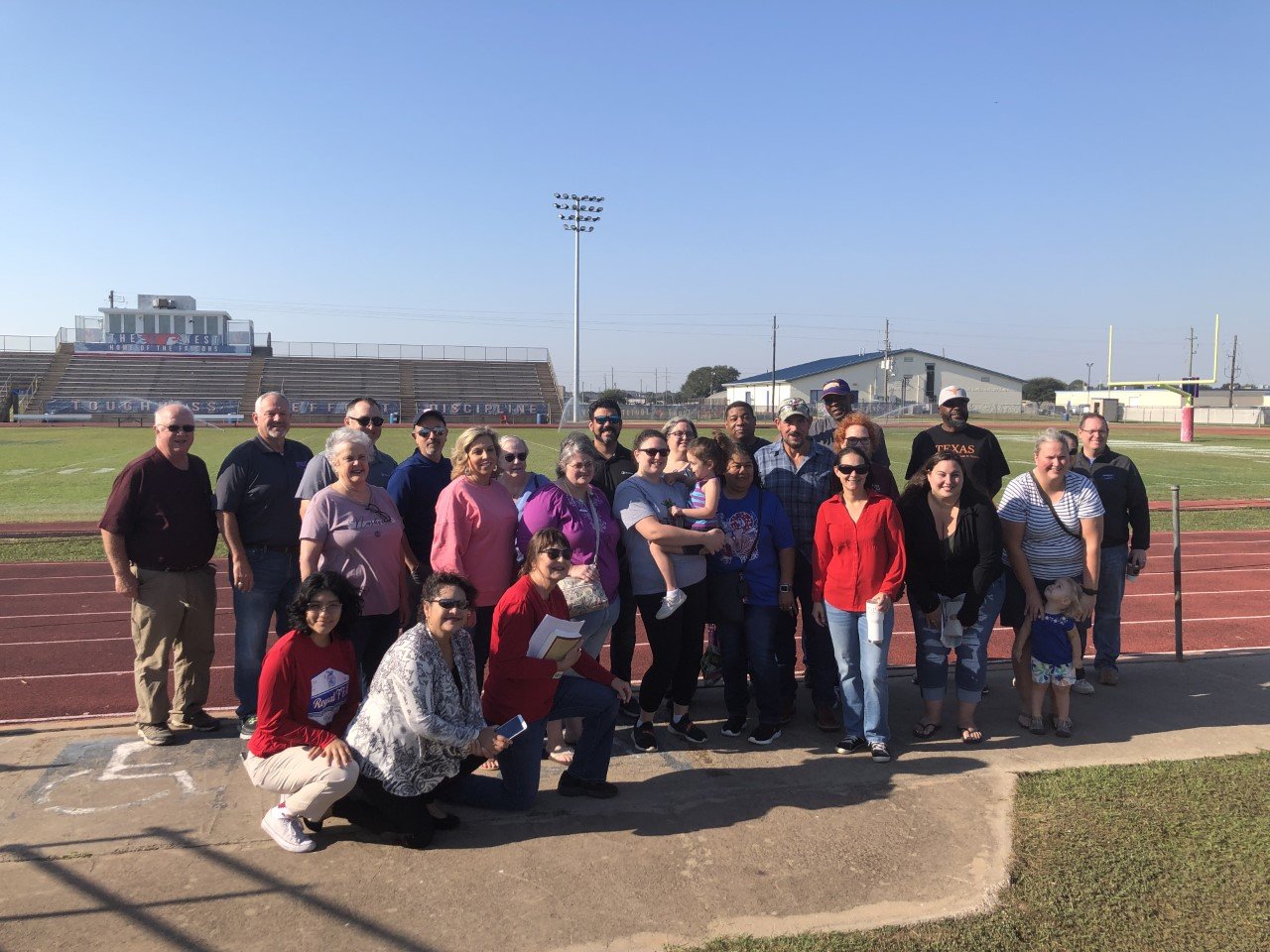 Members of the Royal ISD Facilities Advisory Committee gather Oct. 8 at Falcon Stadium as part of an area tour in which district officials described the forthcoming housing developments in the area. Officials said the district expects about 22,000 homes, and an estimated new 13,000 students, in the next few years.